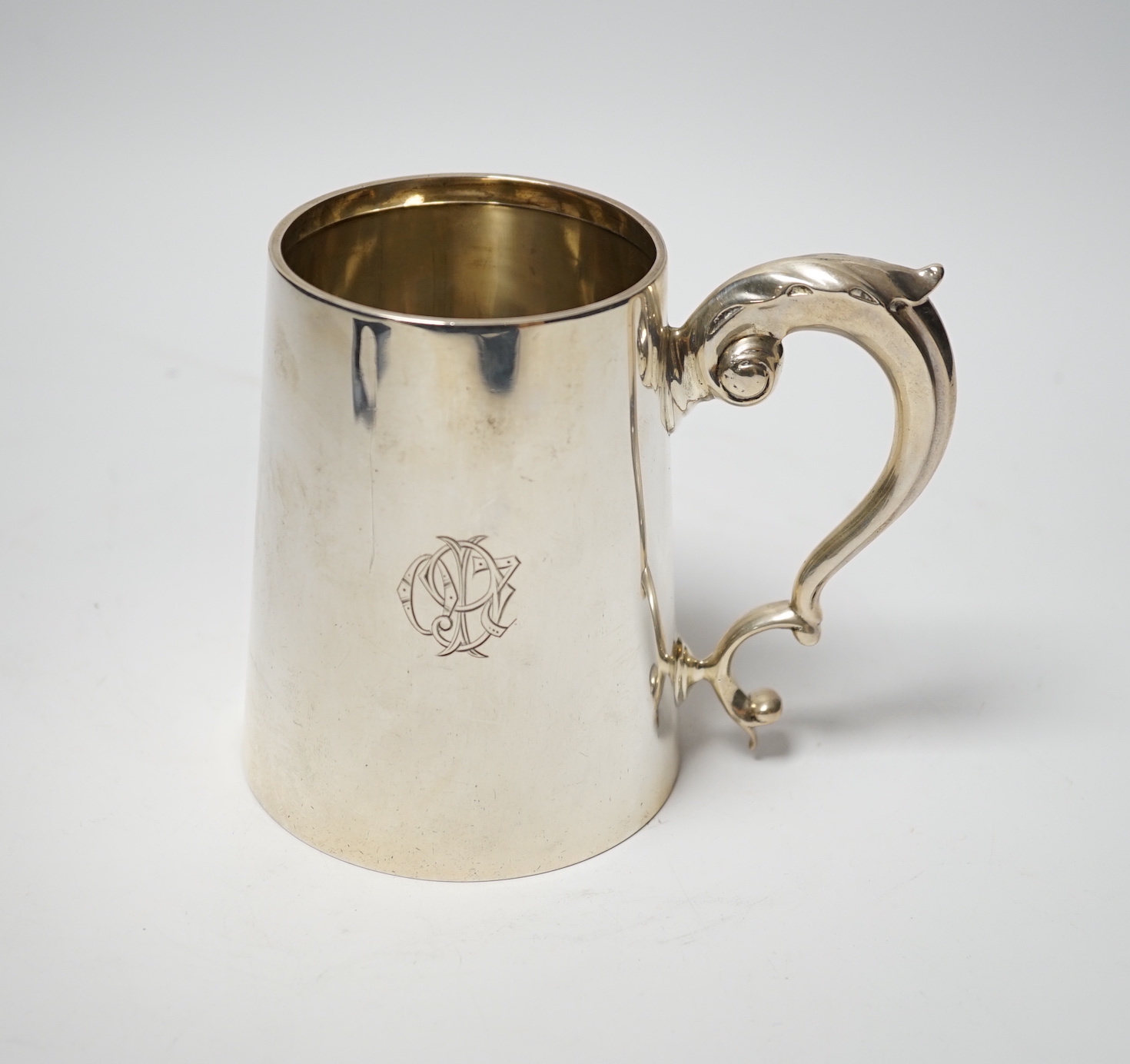 An Edwardian silver mug, of tapering form, William Aitken, Birmingham, 1906, 11.4cm, 12.8oz.